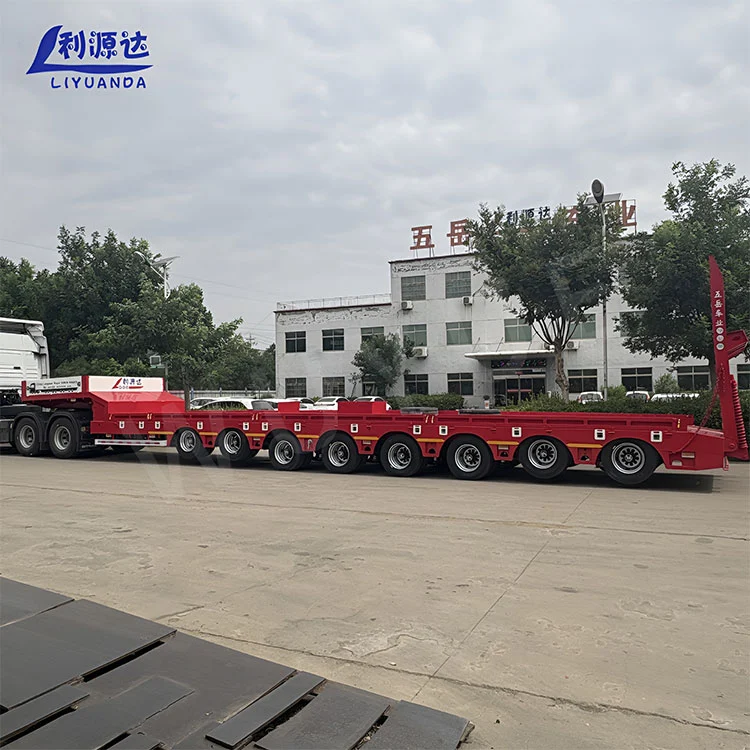 Why Is an Eight-Axle Low-Bed Trailer With A Single Hydraulic Ladder Essential for Heavy Transport Operations?